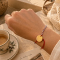 Bracelet médaille amore noué à la main en belgique