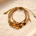bracelet perlé avec petit mot doré