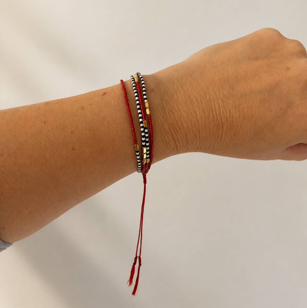 Bracelet rouge doré noir et blanc ethnique