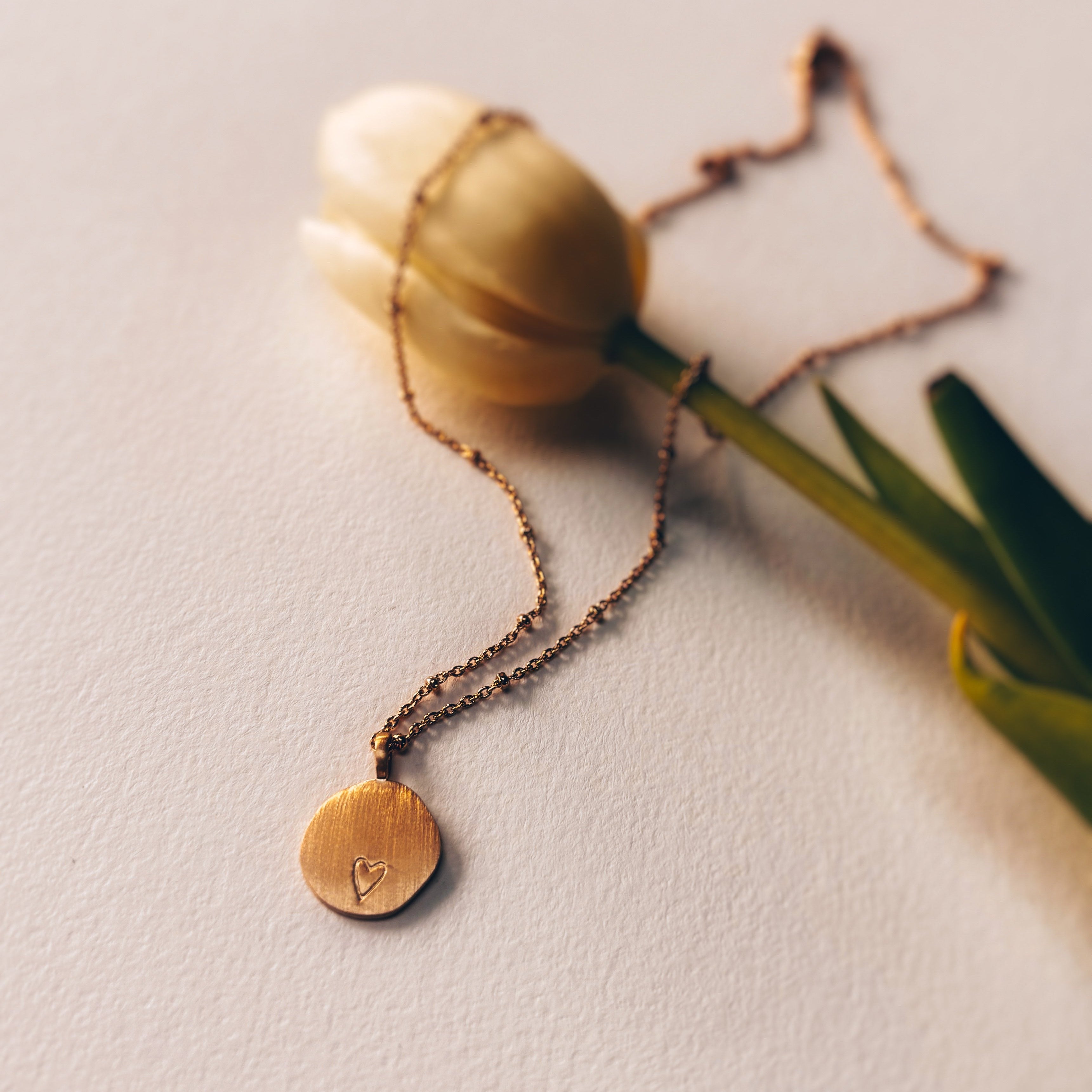 Collier poiçonné d'un coeur pour une personne que l'on aime