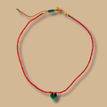 Collier HIPPY rouges avec coeur emeraude