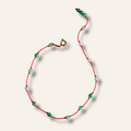 Bracelet Le Lien en émeraude naturelle posé à plat, fermoir mousqueton doré
